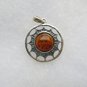 Pendentif Soleil Astrologique - bijou ambre et argent